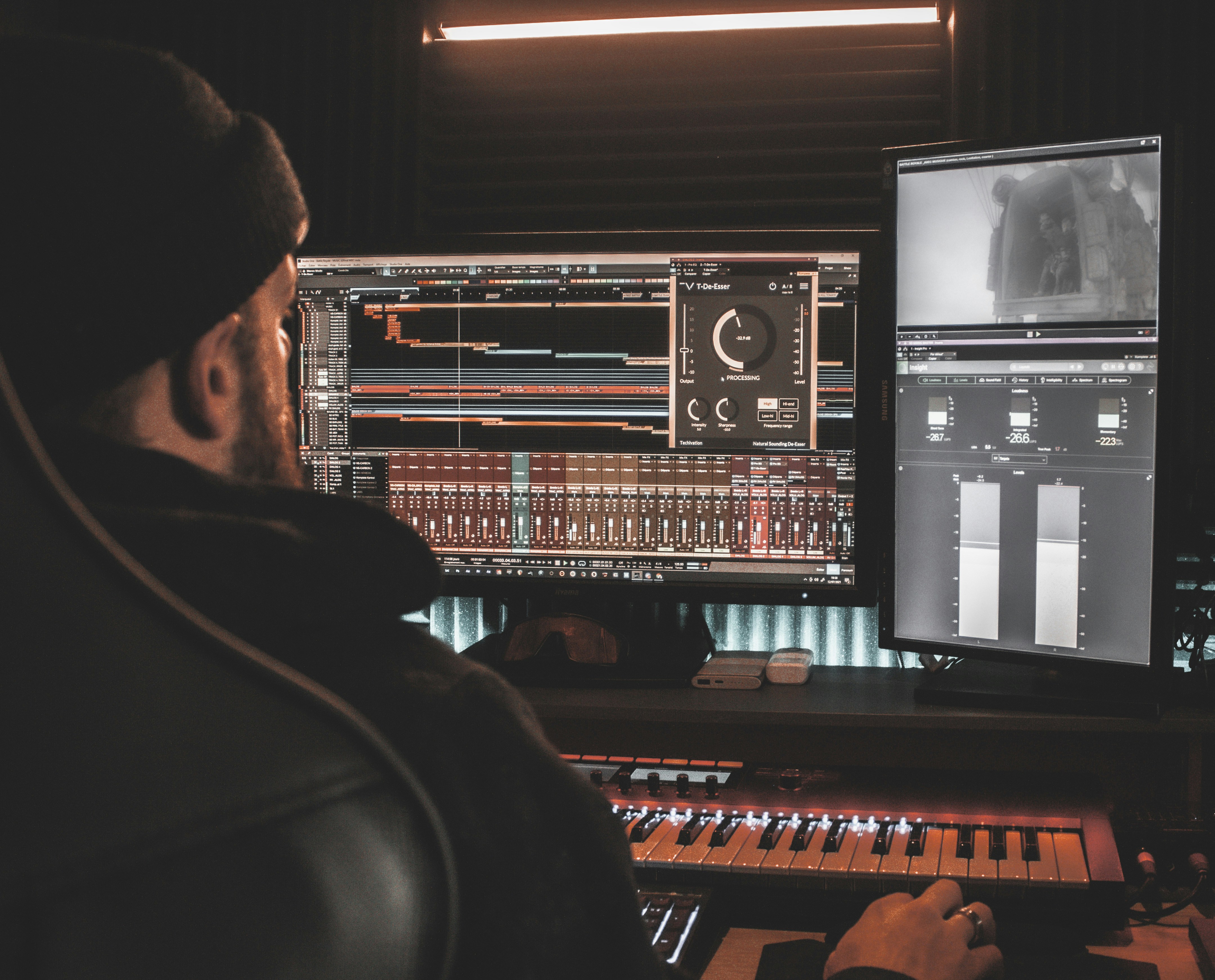 Music producer producing music
