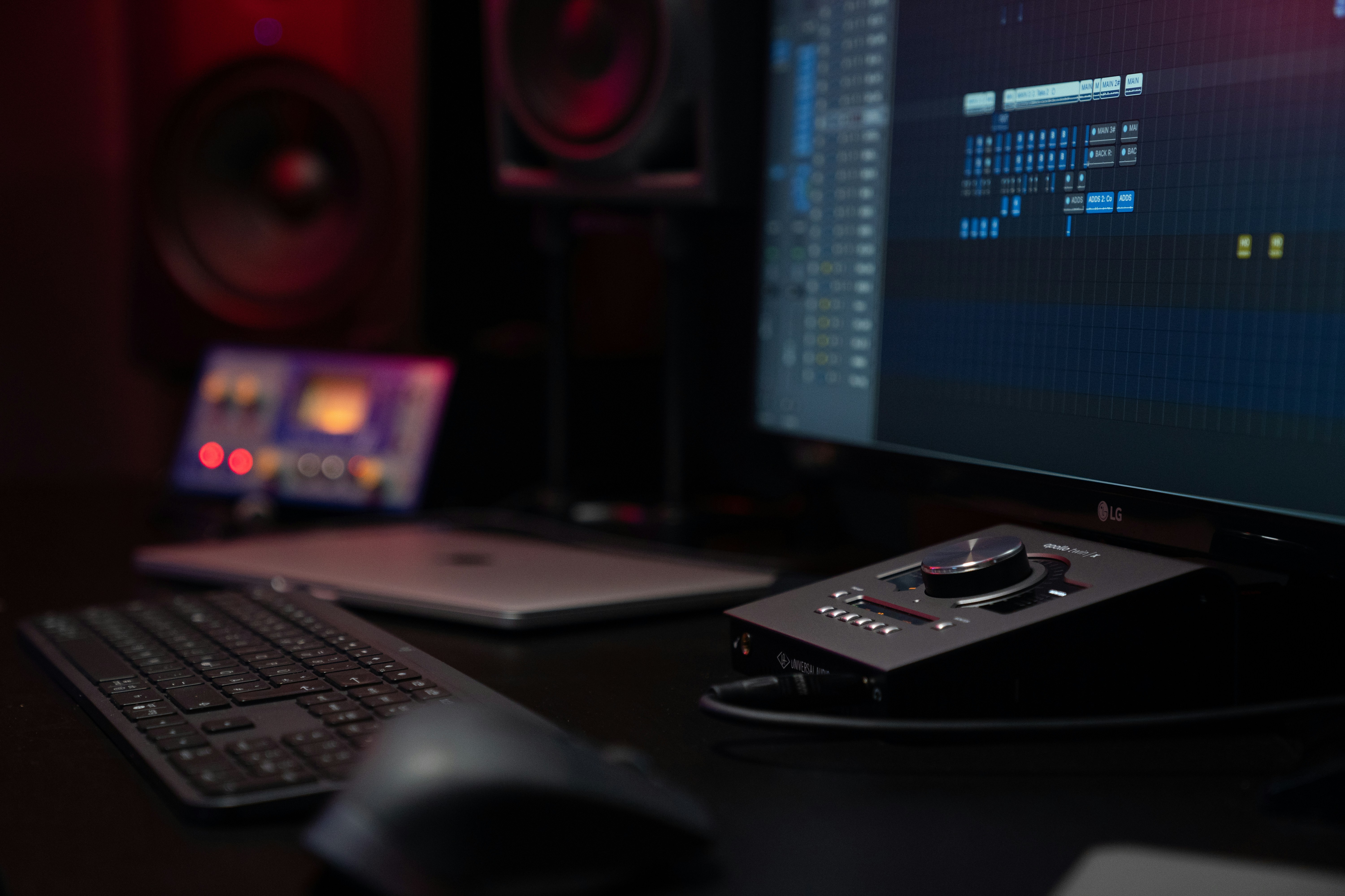 Music production studio with mixing equipment